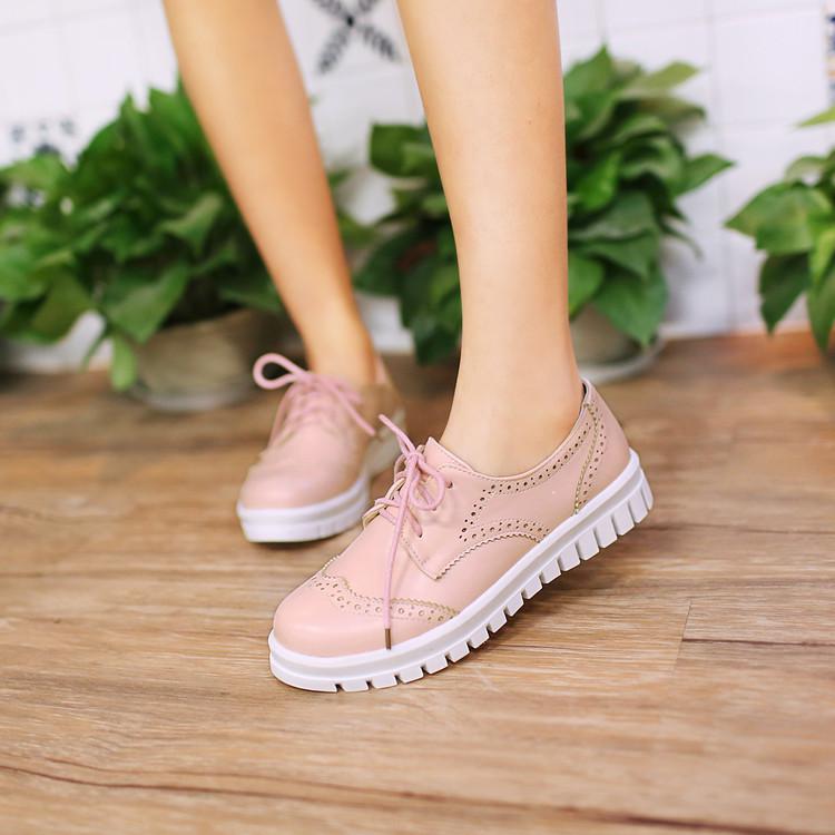 Women's Pure Color Flat Heel Shoelace Sneakers